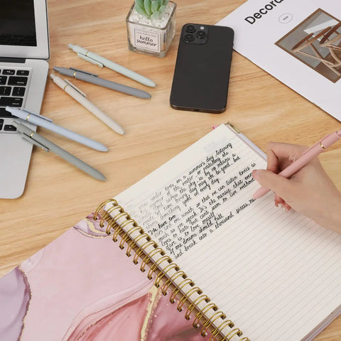 Pack Of Six Smooth Writing Retractable Gel Pens Featuring Snappy Click Mechanism And Fast Drying Black Ink That Rolls Dead Smooth Across Pages ideal for note taking.
