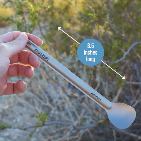 Ultralight Titanium Camping Spoon For Backpacking And Hiking, 16g Silver Utensil With 8.5 Inch Reach, Drawstring Case, held in hand outdoors