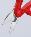 Electrician Shears With Precise Ground Stainless Steel Blades, Fine Serration For Clean Non Slip Cuts, Integrated Cable Cutter For Soft Wires, Plus Belt Holster For Fast On The Go Access And Easy Carry showing close-up of red handle and blades.