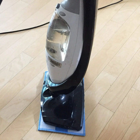 Steam cleaner with Washable Steam Mop Pads Replacement For Haan SI 40 SI 70 SI 35 Steamers Reusable Microfiber Pads on hardwood floor.