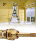 Built Like A Tank Brass Faucet Cartridge With Ceramic Valve Cores For No Nonsense Plumbing Repairs Heat Resistant And Smooth Glide Reliability in focus against a yellow room backdrop.