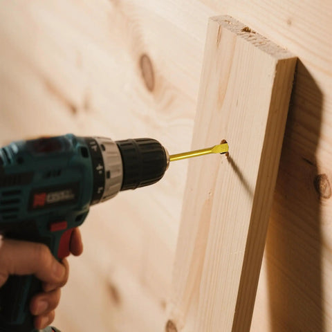 Drilling with 8 Piece Spade Drill Bit Set For Woodworking 3/8 To 1-1/2 Inch Titanium Coated Carbon Steel in wood panel