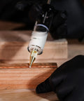 Slick Precision Wood Glue Syringe With Replaceable Tips For Tight Joints offers smooth high pressure application on wood.