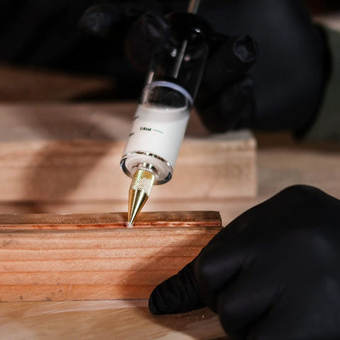 Slick Precision Wood Glue Syringe With Replaceable Tips For Tight Joints offers smooth high pressure application on wood.