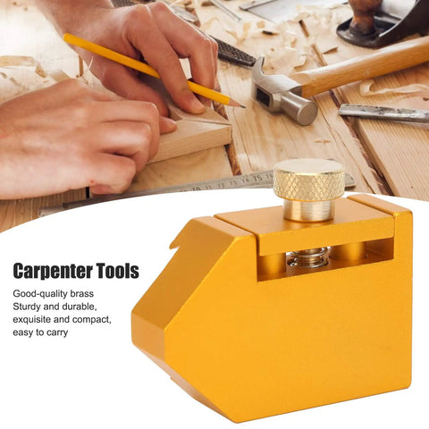 Brass Ruler Positioning Adjuster For Woodworking And Carpentry, Locks Steel Rulers Up To 30mm By 2mm For No Slip Scribing, tool on workbench