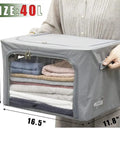 Person holding Stackable Gray Closet Storage Bin 40L with metal frame, clear window, zipper, and label holder for clothes and bedding.