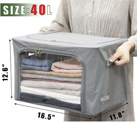 Person holding Stackable Gray Closet Storage Bin 40L with metal frame, clear window, zipper, and label holder for clothes and bedding.