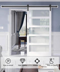42x84 Inch Glass Barn Door Slab With 7Ft Sliding Hardware Kit And Handle, Five Frosted Glass Panels, installed in a living room