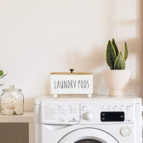 Farmhouse Style Wooden Laundry Pods Container With Lid Rustic Detergent Storage Organizer Box Pod Caddy atop a washing machine