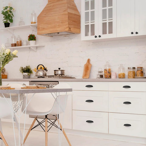Kitchen cabinets with 10 Pack Matte Black Cup Pulls Three And Three Quarters Inch Hole Center Zinc Alloy Cabinet Hardware installed.