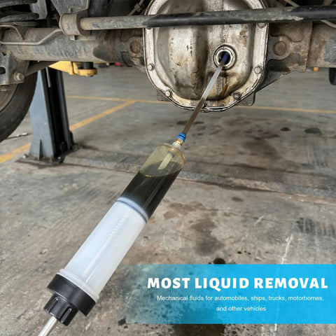 500cc Manual Automotive Fluid Extractor Pump With Two Durable Extension Tubes in use for quick oil drainage from a vehicle.
