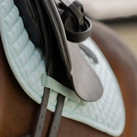 Side view of Dressage Saddle Pad With Moisture Wicking Tricot Backing In Misty Jade for everyday riding comfort on horse