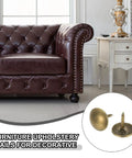 Total Breeze 100 Pcs Top Shelf Upholstery Tacks With 3/8 Inch Round Head And 0.35 Inch Length Smooth Metal Push Pins in use on a sofa.