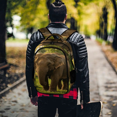 Person walking with Elephant Printed Unisex Backpack With Large Capacity, Durable Polyester All Day Everyday Carry Bag.