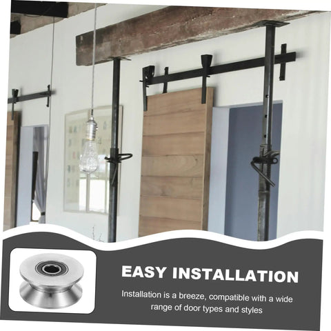 Heavy Duty Stainless Steel Sliding Door Rollers U Groove Caster Wheels with smooth glide track mounted on rails in a modern setting.