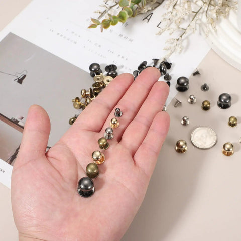 Rock Solid Gold Tone Leather Rivets With Ball Head Studs And Quick Spin Chicago Screws For Handbag Repair Belt Mending And Custom Craft DIY Projects That Set Up Without A Sweat And Deliver Pro Results Every Time, shown in hand.