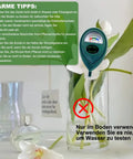 2 Pack Soil Moisture And pH Meter Kit No Battery Required next to flower vase illustrating indoor use with digital dial display