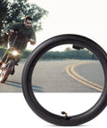 Heavy Duty 14x2.125 Inner Tube With Angled Valve Stem For Electric Scooters And E Bikes, shown near a road with a cyclist.