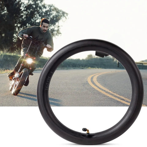 Heavy Duty 14x2.125 Inner Tube With Angled Valve Stem For Electric Scooters And E Bikes, shown near a road with a cyclist.