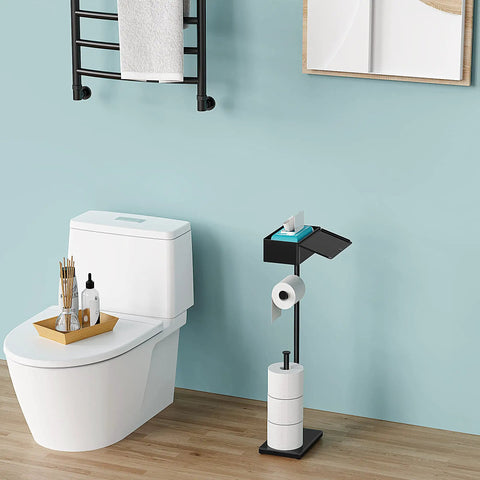 Free Standing Toilet Paper Holder With Storage Shelf Keeps Your Bathroom Neat And Tidy Holds Extra Toilet Paper Rolls Wet Wipes Feminine Products And Your Phone Or Coffee Cup In A Sleek Black Finish beside toilet on light wood floor