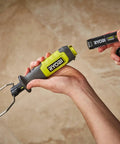 4V Cordless Hot Foam Cutter With 2.0Ah Battery held in hand with battery pack, showcasing ergonomic design for model making and crafts.