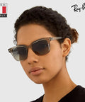 Model wearing Dope Square Shaped Non-Polarized Sunglasses For Men And Women With Light Grey Gradient Lenses, made in Italy.