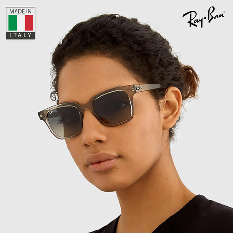 Model wearing Dope Square Shaped Non-Polarized Sunglasses For Men And Women With Light Grey Gradient Lenses, made in Italy.