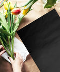40 Sheets Flower Wrapping Paper For Bouquets And Gifts, Lightweight Floral Paper With Cuttable Design on table with tulips
