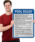 Man holding Pool Rules Sign 24 X 18 Inch Must Shower No Spitting No Diving No Running Aluminum Exterior Sign 80 Mil Laminated Rustproof