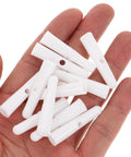 Top Shelf Folding Umbrella Repair Kit With Durable White Plastic Tail Beads And Quick Setup Design For Hassle Free Bone Coverage. White caps in hand.