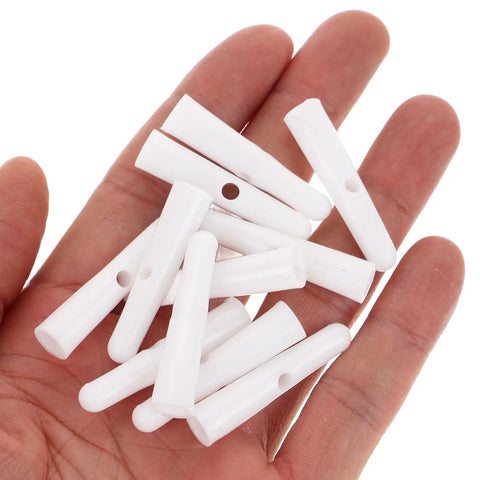 Top Shelf Folding Umbrella Repair Kit With Durable White Plastic Tail Beads And Quick Setup Design For Hassle Free Bone Coverage. White caps in hand.