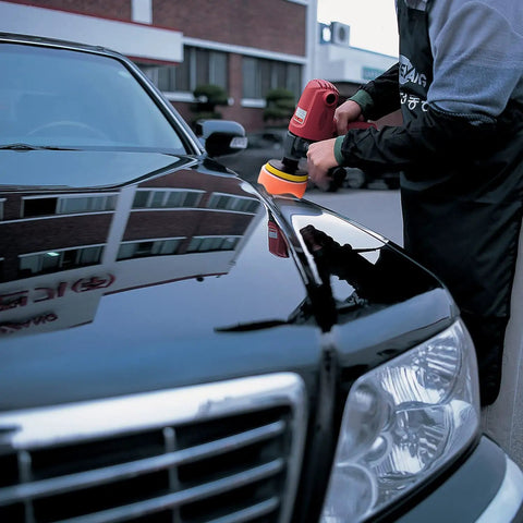 Person using 120 Pack 3 Inch Polishing Pad Set For Drill Sanding Attachment With 5/16 And 1/4 Inch Shanks on car hood