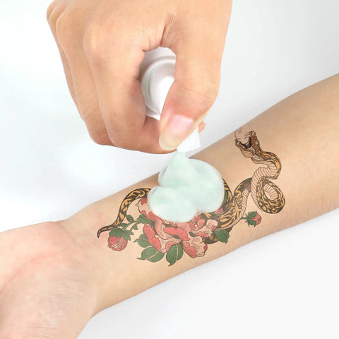 Ultra Concentrated Green Soap For Tats And Piercings With Foam Bottle 120ml 4OZ Clean Skin Gear Built For Safe Non Irritating Cleansing During Procedures And Aftercare applied to tattooed arm