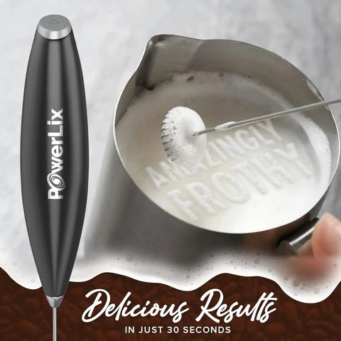 Powerful Handheld Milk Frother With Stand Battery Operated Foam Maker Wand For Coffee And Lattes creating froth in metal cup