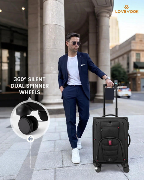 Man with lightweight softside carry on luggage with spinner wheels, black color, TSA lock, airline approved, 22x9x14 cabin size.