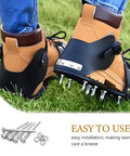 Person wearing 30 Piece Lawn Aerator Shoes Spikes Set For Lawn Care And Yard Maintenance on grass with spare metal spikes shown.