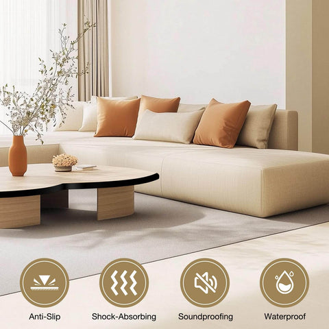 Minimalist beige sofa with orange cushions, coffee table, decorative vase, and Neoprene Foam Padding benefits: anti-slip, shock-absorbing, soundproofing, waterproof.