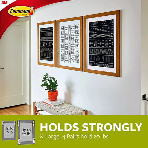 Three frames on wall using Heavy Duty Picture Hanging Strips XL 20Lb Capacity 10 Pairs 20 Strips Damage Free Hangers