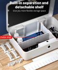 Interior of a biometric fingerprint safe storage box with built-in separation and detachable shelf, suitable for small valuables.