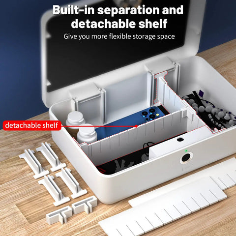Interior of a biometric fingerprint safe storage box with built-in separation and detachable shelf, suitable for small valuables.