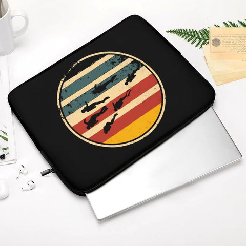 Scuba Dive Inspired Laptop Sleeve For 15 Inch Waterproof Durable Protective Case Carrying Bag Scratch Resistant Notebook Protector With Top Zipper Designed For Travel And Everyday Use, shown closed beside a partially visible laptop