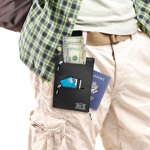 Hidden Travel Belt Wallet With RFID Blocker, black strap visible, holding cash, cards, and passport on person's waist