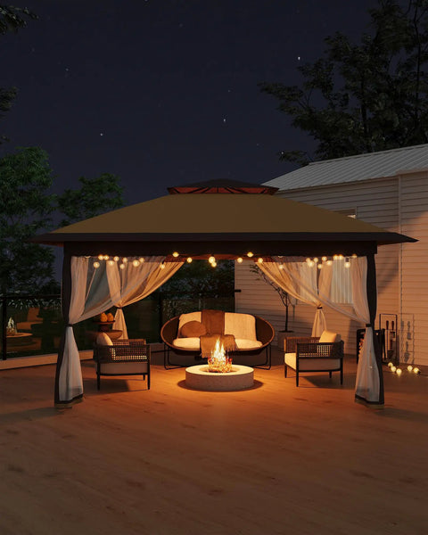 13x13 Ft Pop Up Canopy Gazebo With One Push Setup For Quick Shade Includes 4 Sand Bags Mosquito Netting Height Adjustable Sides Outdoor Backyard Party And BBQ Shelter In Khaki And Coffee, night setup with lights and furniture.