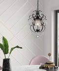 Chic Mini Bronze Chandelier 1 Light 11 Inch Crystal Ceiling Fixture elegantly hangs in modern room, showcasing its unique design.