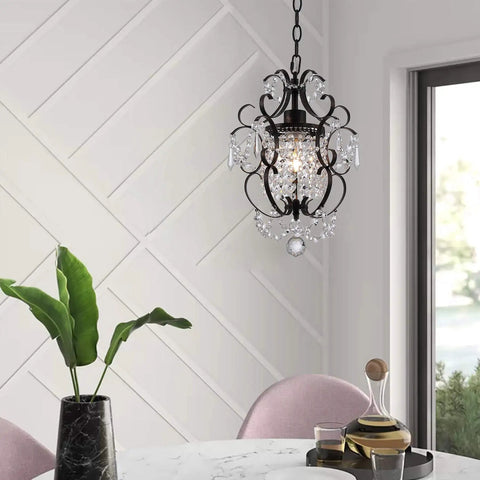 Chic Mini Bronze Chandelier 1 Light 11 Inch Crystal Ceiling Fixture elegantly hangs in modern room, showcasing its unique design.
