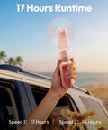 3 In 1 Portable Handheld Fan Foldable Lipstick Size USB Rechargeable Personal Cooler For Travel In Pink in outdoor scene