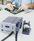 Technician using Powerful Digital Hot Air Rework Station With LCD Display 1000W 3 Channel BGA Soldering Adjustable