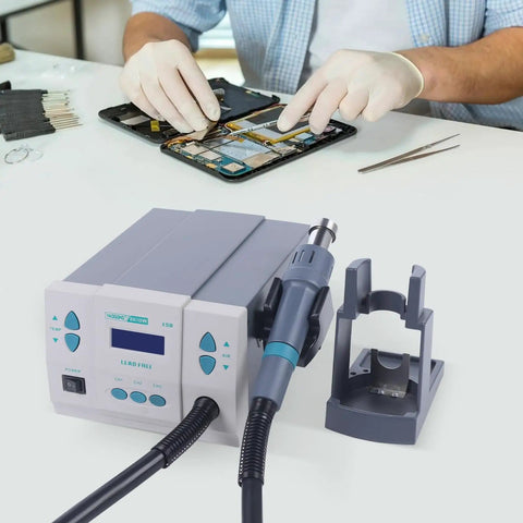 Technician using Powerful Digital Hot Air Rework Station With LCD Display 1000W 3 Channel BGA Soldering Adjustable