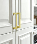 10 Pack 5 Inch Brushed Gold Cabinet Pulls for Kitchen Cabinets Dresser Drawers Modern Zinc Alloy Handles 128mm Easy Install Durable Hardware Premium Cabinet Pulls installed on white cabinet