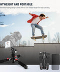 Compact Portable Travel Mini Tabletop Tripod With 360 Degree Ball Head Aluminum Desk Tripod for DSLR Cameras, skateboarder in background.
